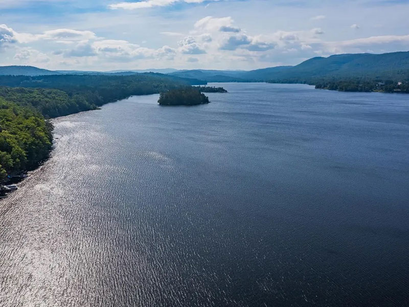 An aerial photo taken of Mascoma Lake during summer